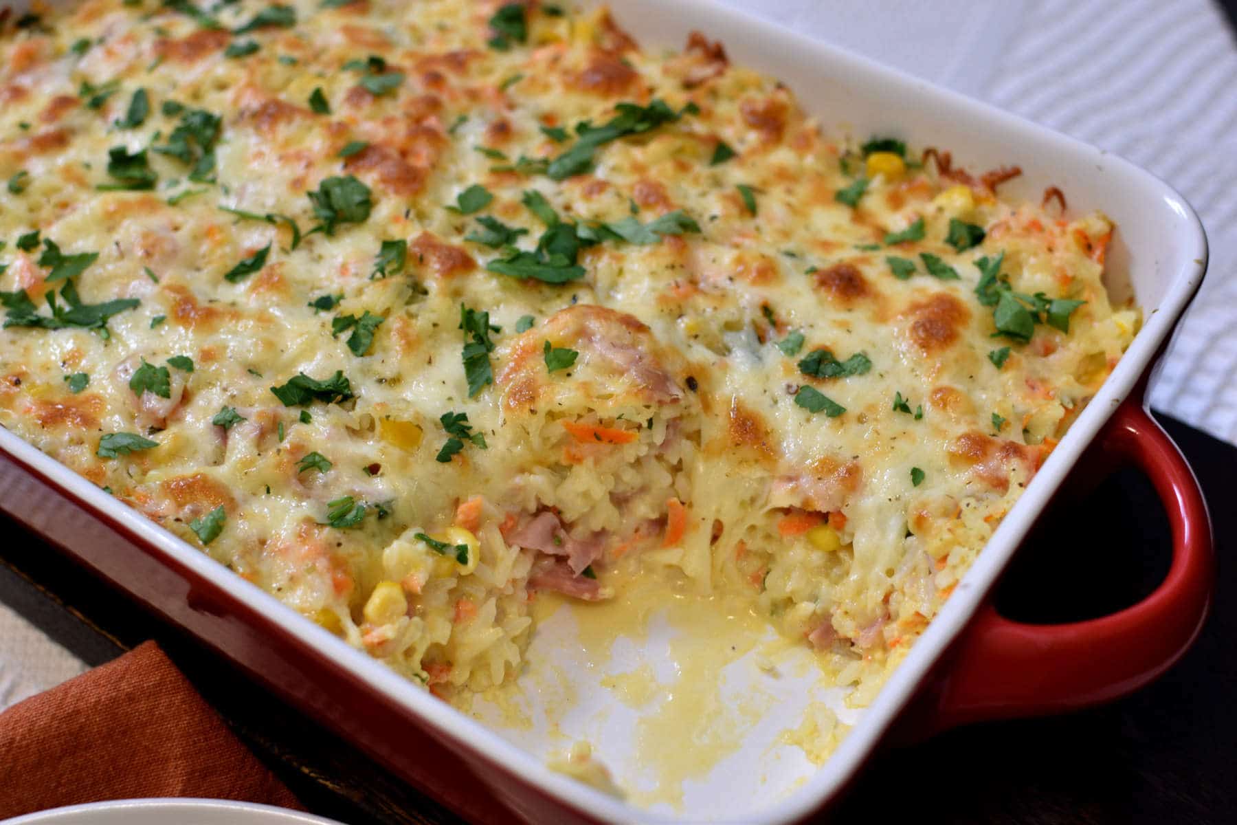 creamy and cheesy rice with ham and vegetables casserole