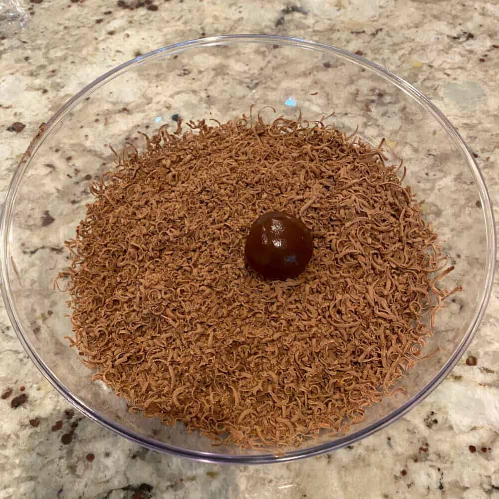 rolled brigadeiro in grated chocolate.